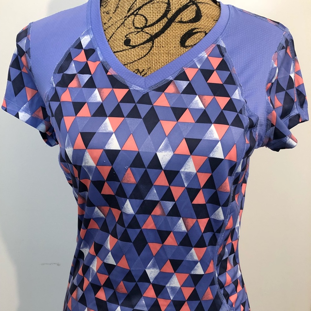 Purple  short sleeve yoga shirt and paint set tech gear.